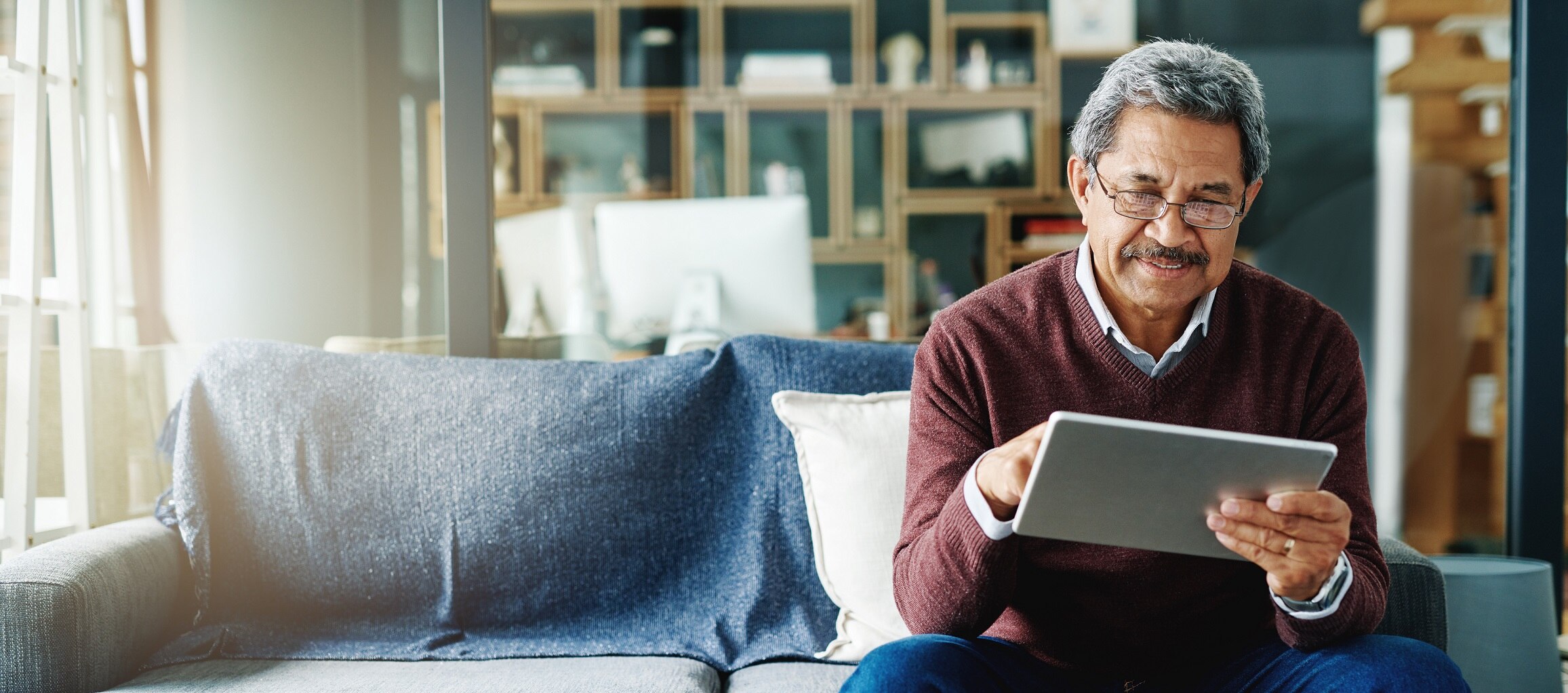 Senior on tablet